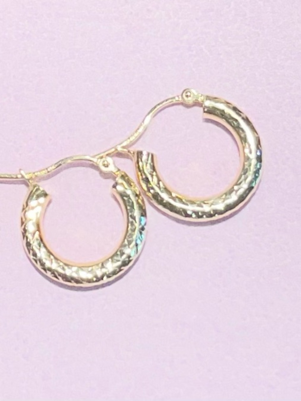 14k Solid Yellow Gold Diamond
Cut Textured Round Hoop Earrings
Marked - Picture 6 of 14